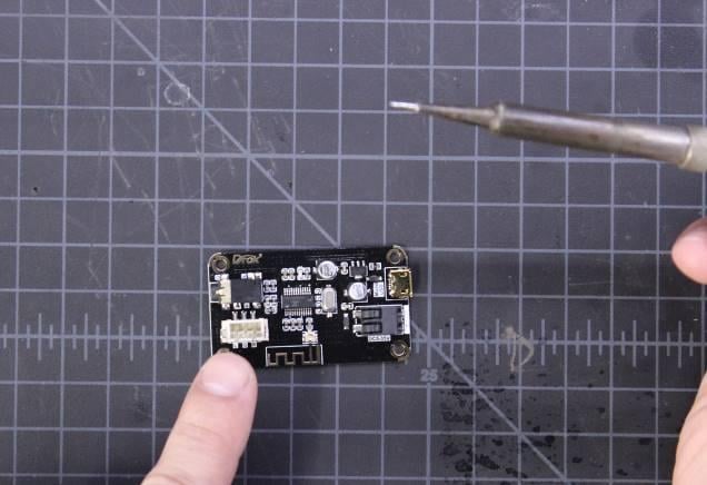 Desolder and remove the three pin speaker connector from the Bluetooth module