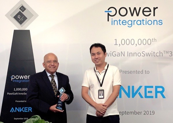 Balu Balakrishnan (left) of Power Integrations delivers the one-millionth GaN-Based InnoSwitch3 integrated circuit to Steven Yang (right) of Anker