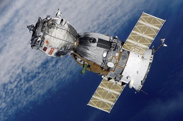 A soyuz satellite in space.
